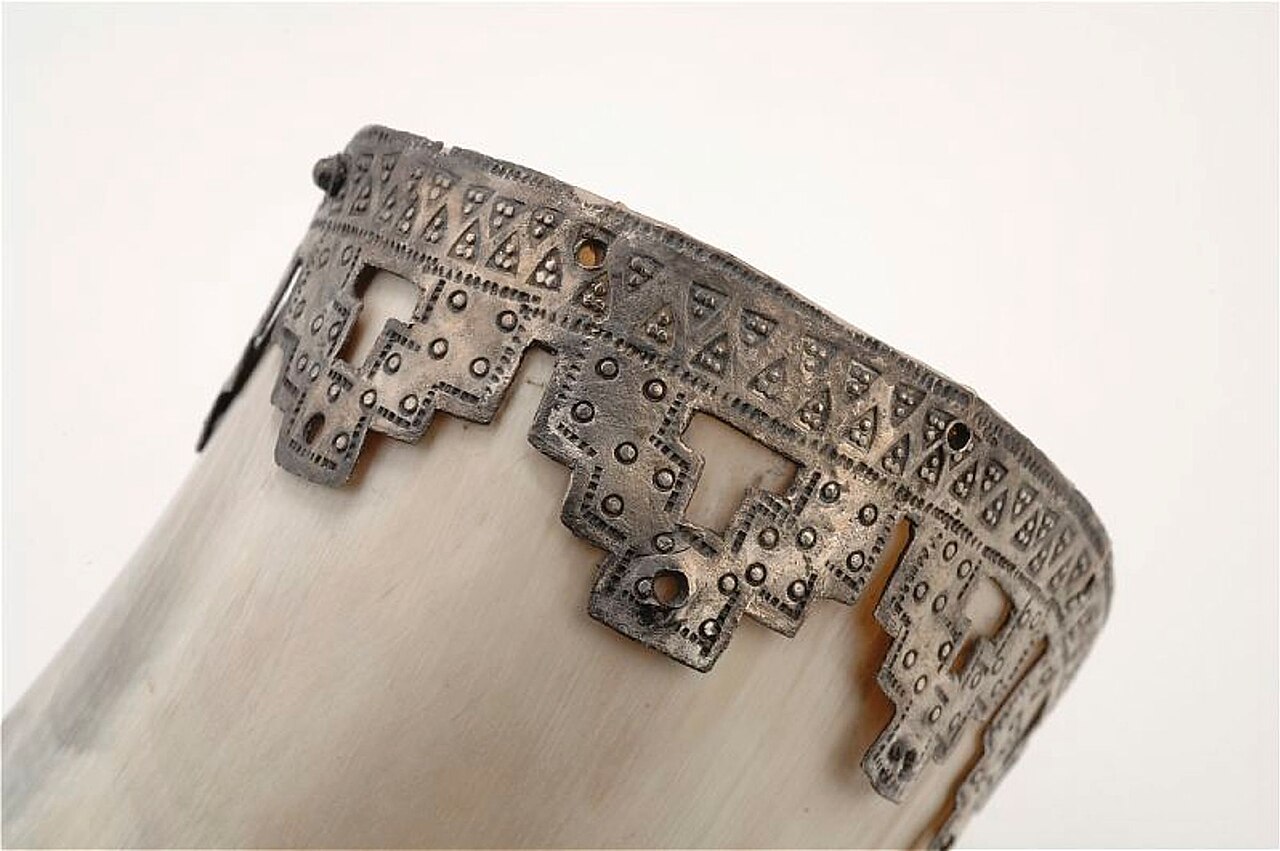 Viking Age silver drinking-horn mount, mounted on a reconstructed horn